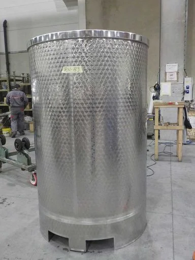 Back view of a 1500 L stainless steel Letina PV forklift transport tank with a lifting skirt.