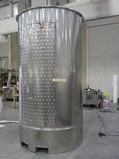 Back view of a 4900 L stainless steel Letina PV forklift transport tank with a lifting skirt and a cooling jacket.