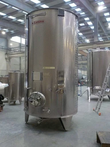 Front view of a professional, marbled 7300 L stainless steel Letina PZP variable capacity tank for wine.