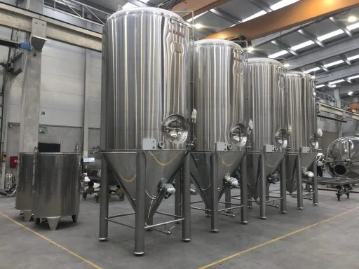 Conical fermenters lined up.