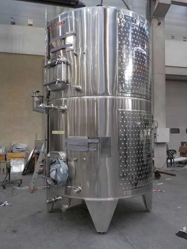 Side view of a marbled stainless steel Letina ZK multi-chamber tank with two 5200 L chambers and cooling jackets.